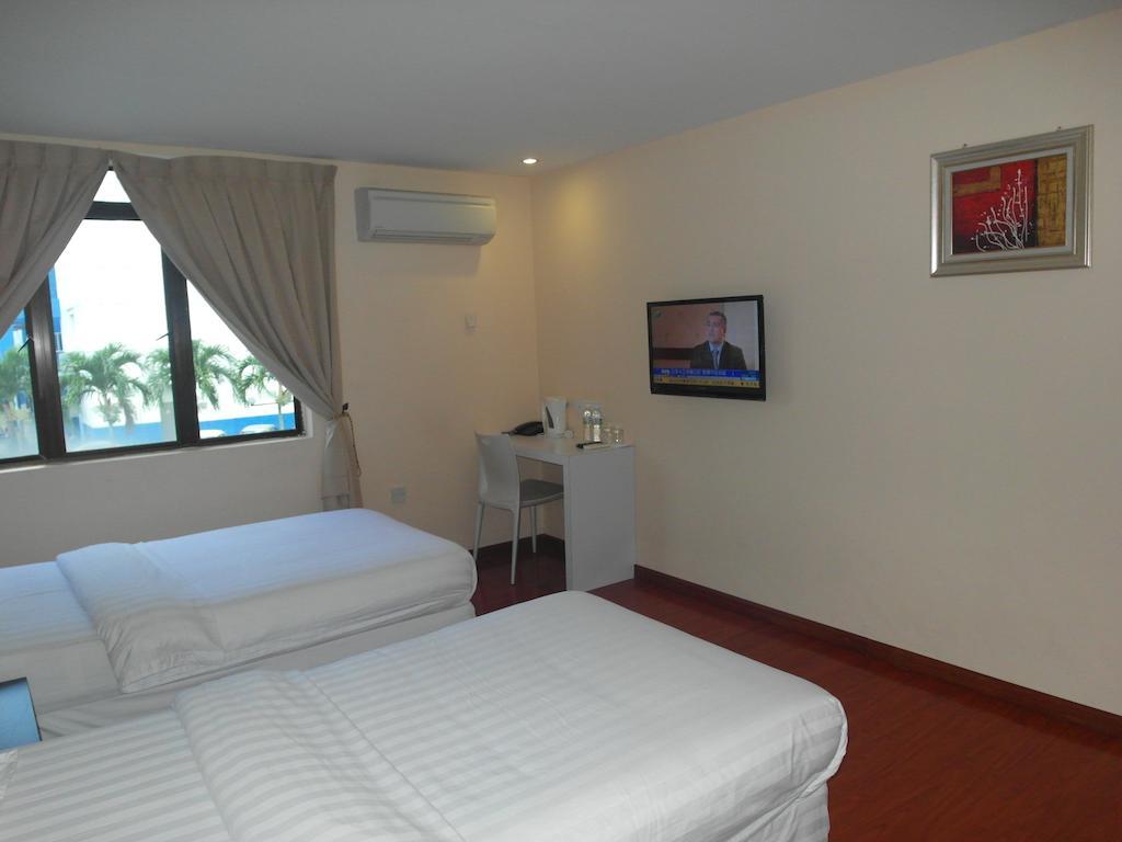 Mcity Inn Miri Kamer foto